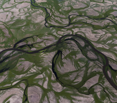 Photo of meandering rivers from above from the documentary River (2021)