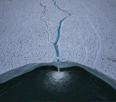 Glacial river emptying into from the documentary River 2021 the ocean